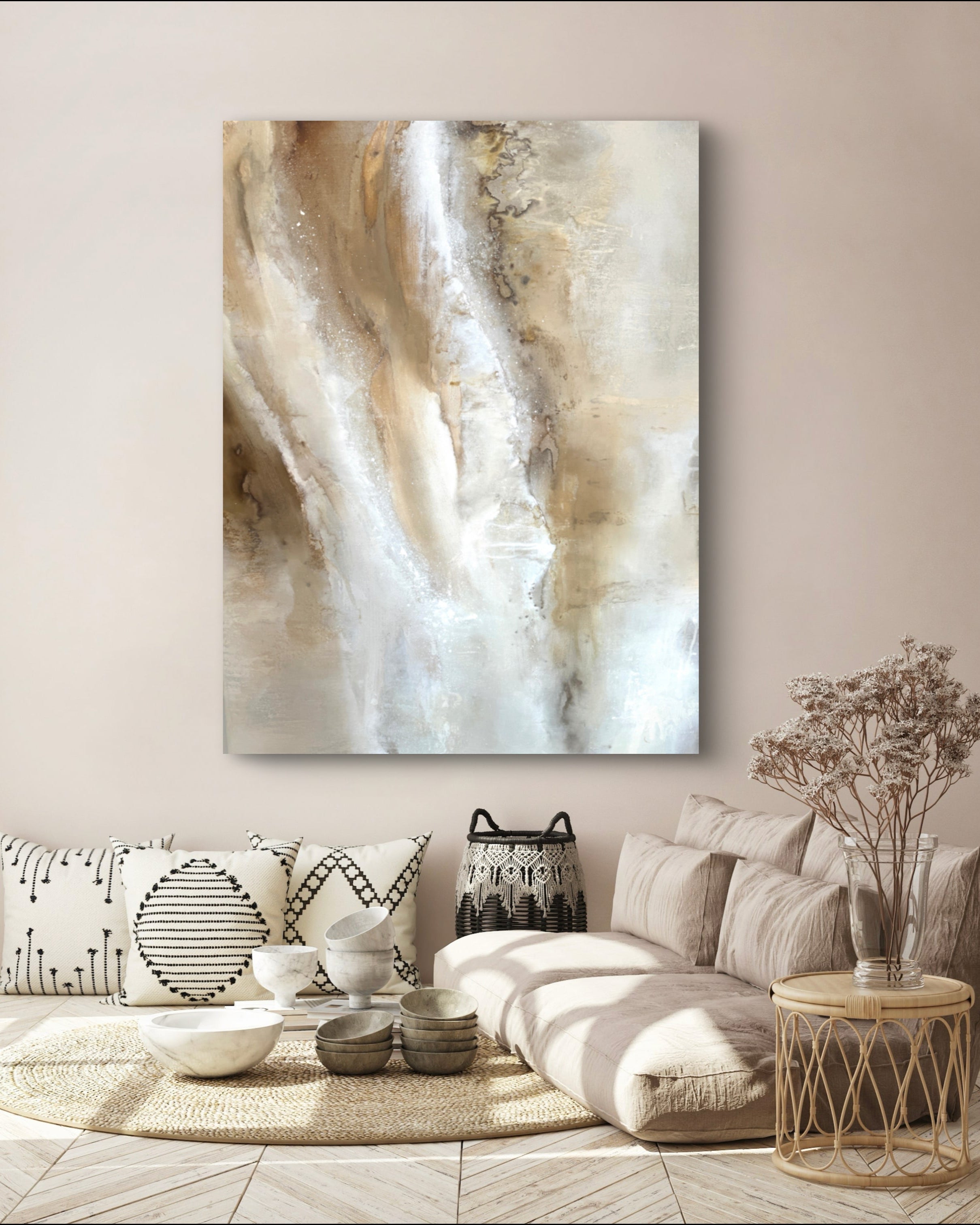 Living room with abstract painting on the wall, sofa, and decorative items.